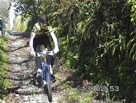 The lane turns into a track past Hansel Mill